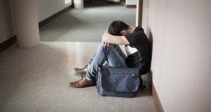 student sad in hallway